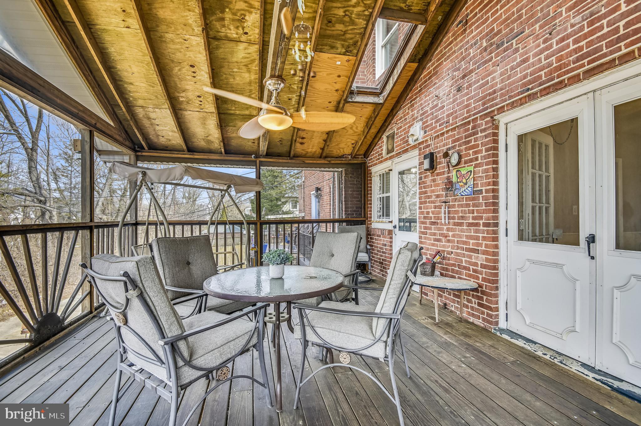 4816 Coleherne Road Baltimore, MD 21229 - Photo 18 of 44 Screened-in porch/deck.