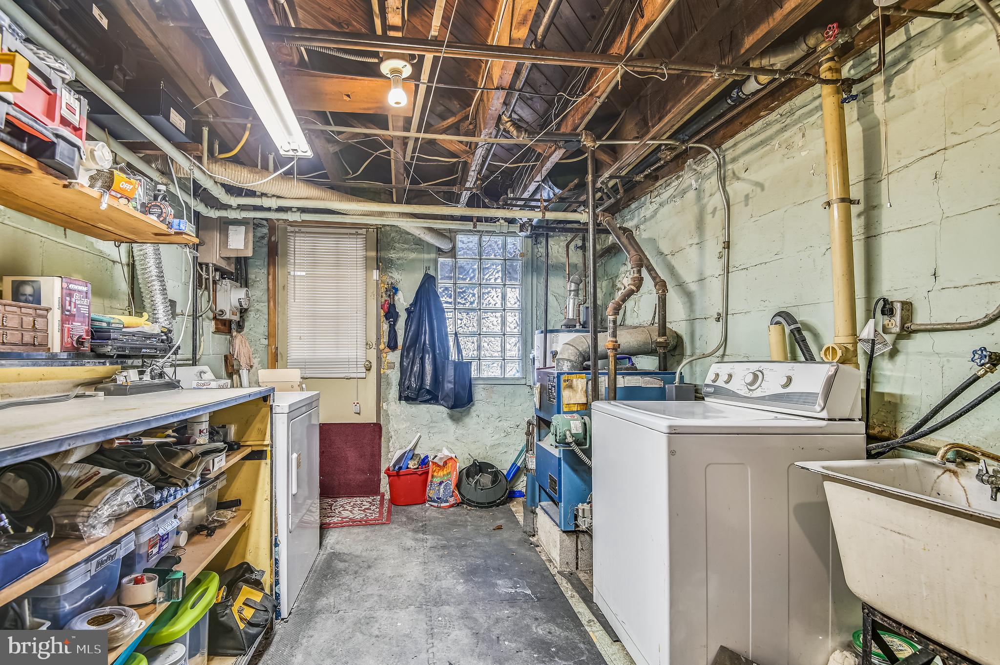 4816 Coleherne Road Baltimore, MD 21229 - Photo 35 of 44 Laundry/Utility Room w-Workbench