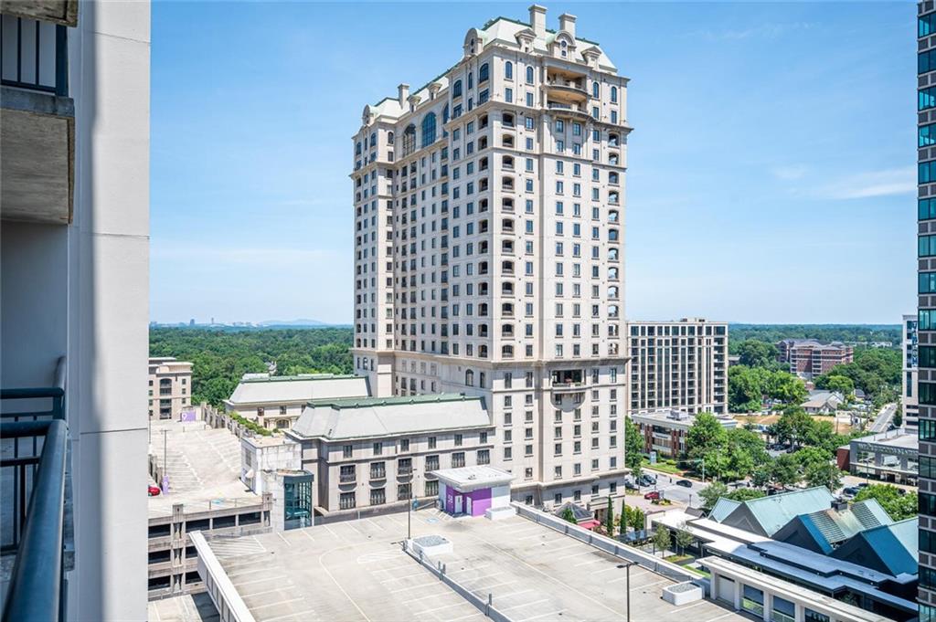 a view of balcony with a potted plant
