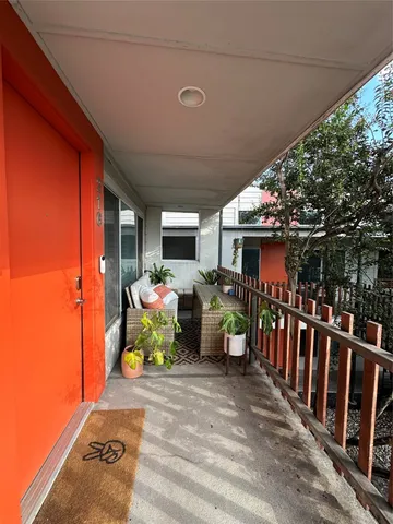 a view of a porch with furniture