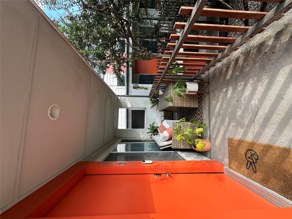 2200 Dickson Drive, Unit 216 Austin, TX 78704 - Photo 1 of 10 a view of a porch with furniture