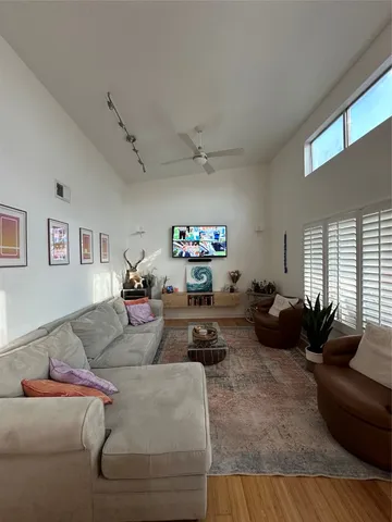 a living room with furniture and a couch