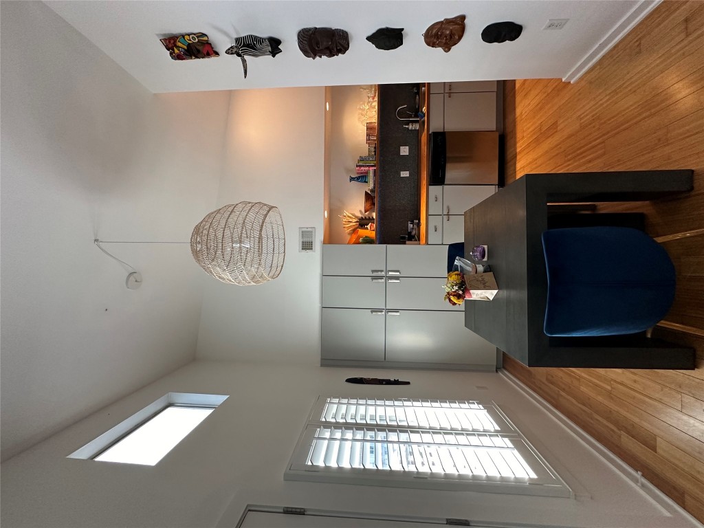 2200 Dickson Drive, Unit 216 Austin, TX 78704 - Photo 9 of 10 a view of a dining room with a table and chairs