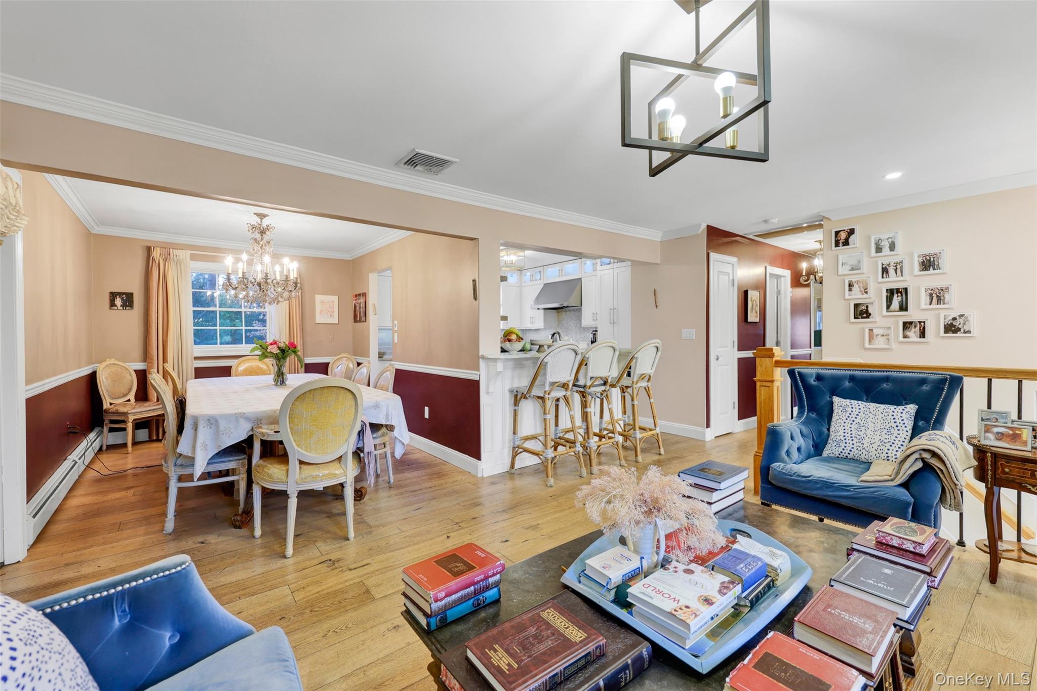 3 Kakiat Lane Spring Valley, NY 10977 - Photo 15 of 44 a living room with furniture a rug and a chandelier