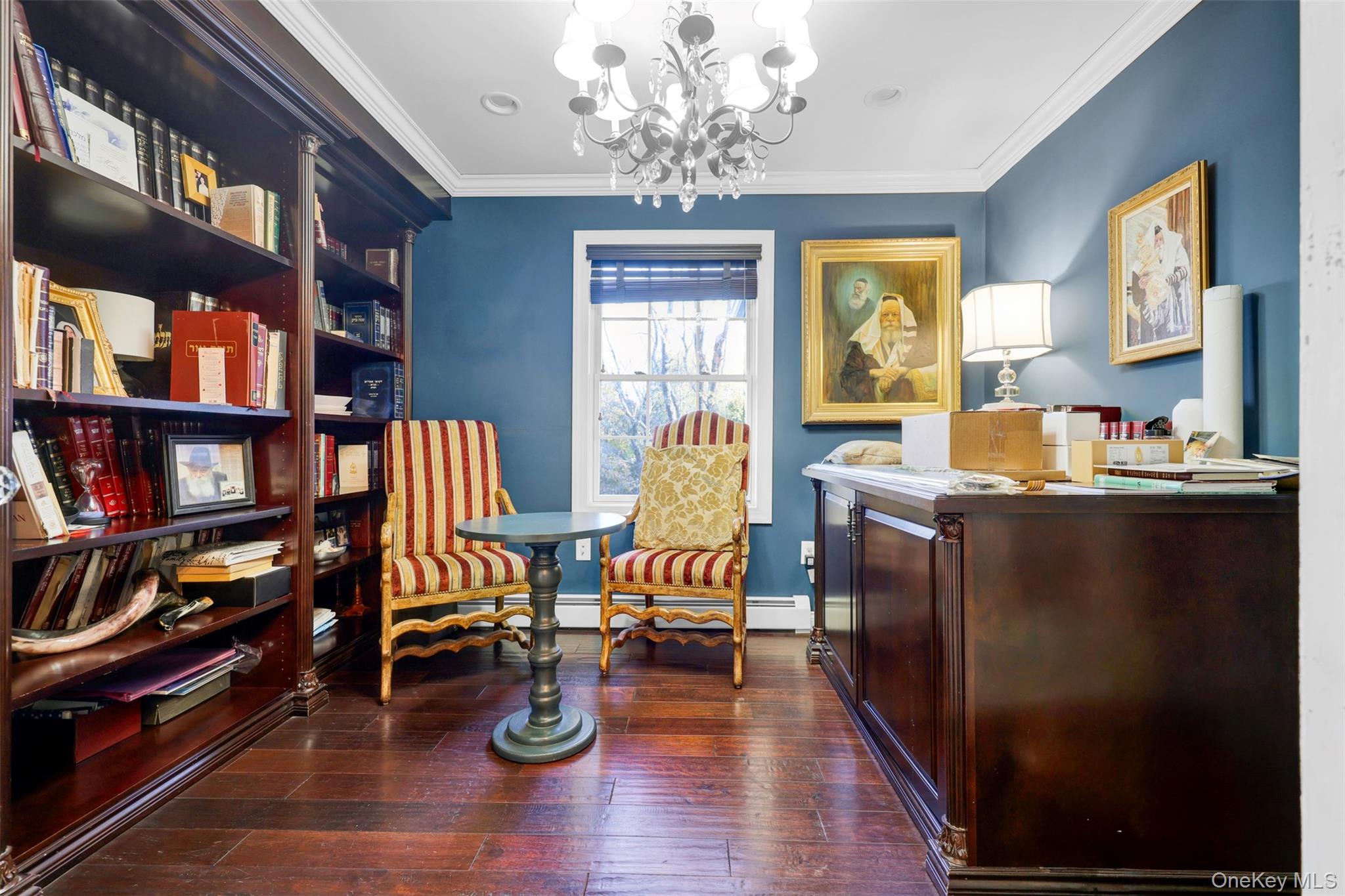 3 Kakiat Lane Spring Valley, NY 10977 - Photo 18 of 44 a living room with furniture and a bookshelf