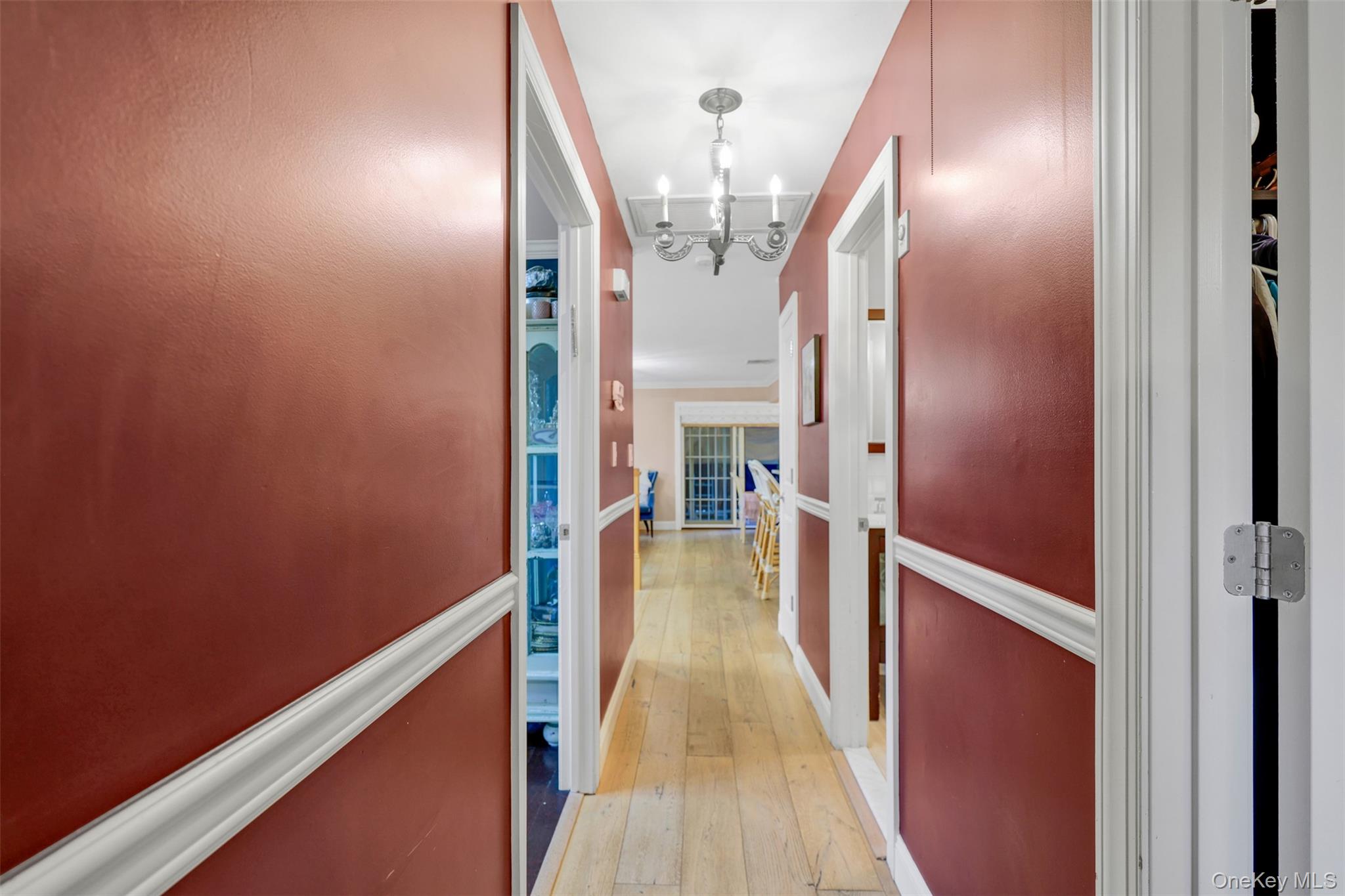 3 Kakiat Lane Spring Valley, NY 10977 - Photo 22 of 44 a view of a hallway with wooden floor and staircase
