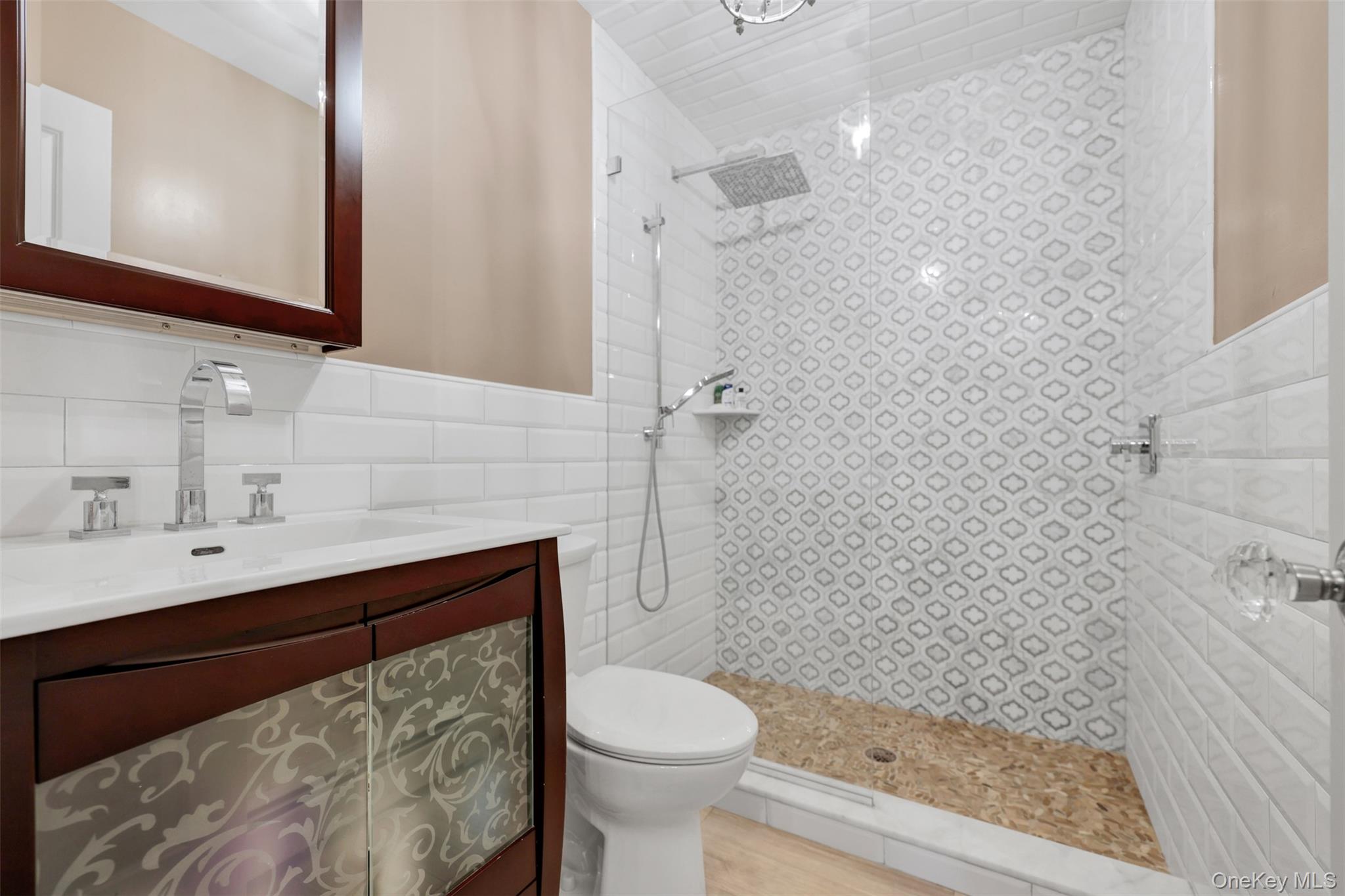 3 Kakiat Lane Spring Valley, NY 10977 - Photo 25 of 44 a bathroom with a sink toilet and shower