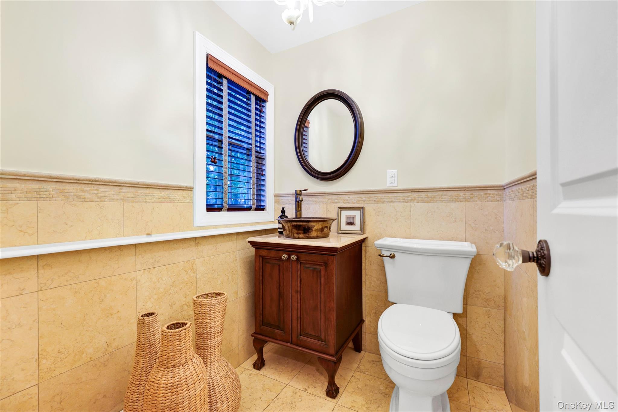 3 Kakiat Lane Spring Valley, NY 10977 - Photo 32 of 44 a bathroom with a toilet sink and mirror