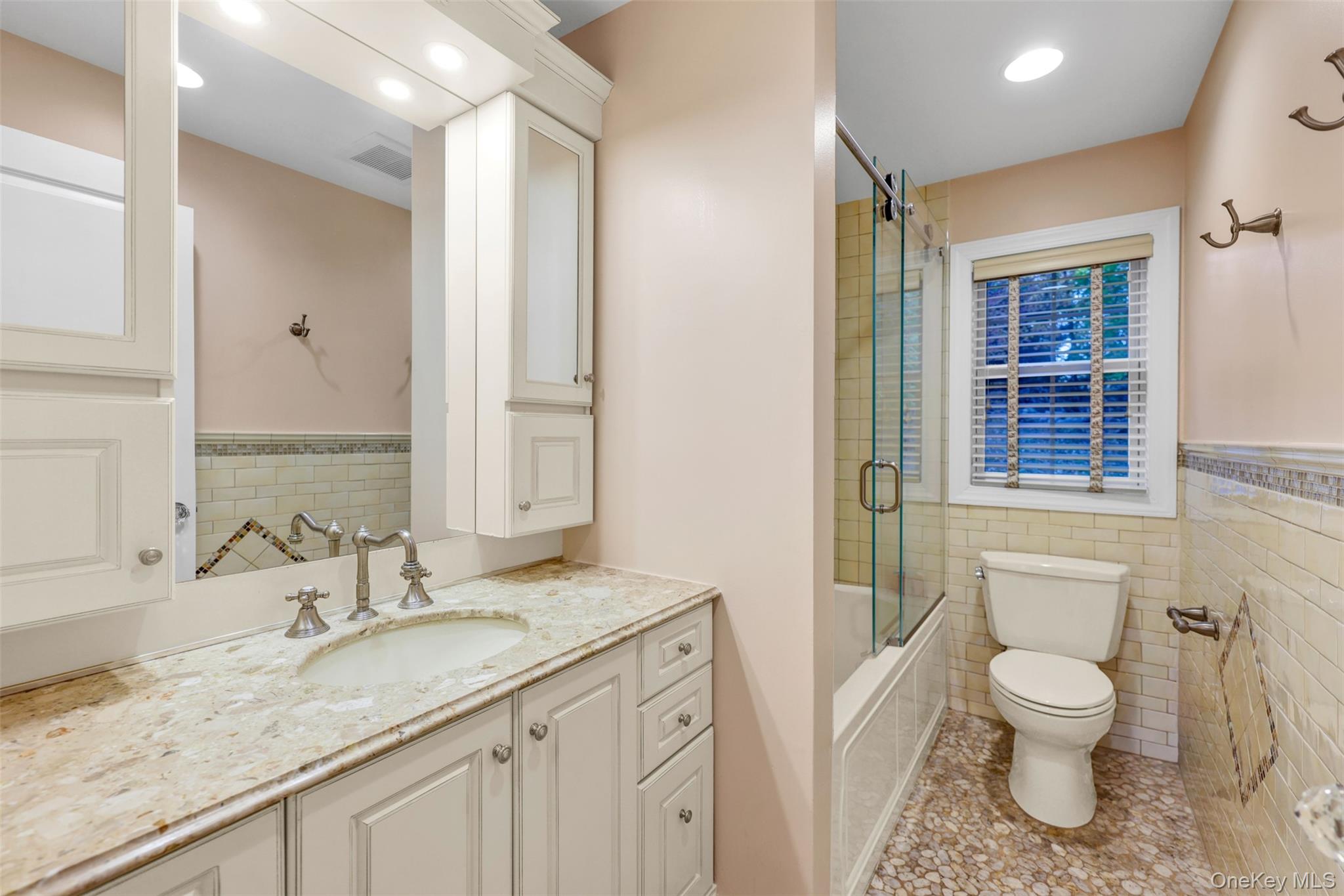 3 Kakiat Lane Spring Valley, NY 10977 - Photo 38 of 44 a bathroom with a granite countertop sink toilet and shower
