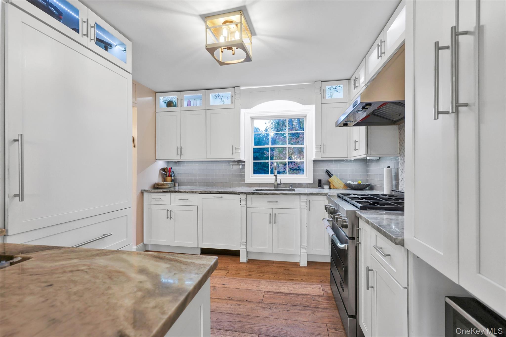 3 Kakiat Lane Spring Valley, NY 10977 - Photo 6 of 44 a kitchen with stainless steel appliances granite countertop a stove and a sink