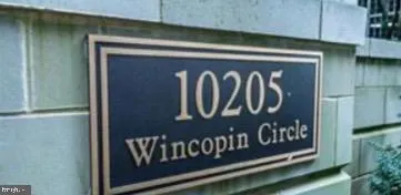 a bedroom with double bed and a night stand