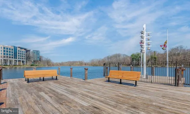 a view of a swimming pool with a lounge chair