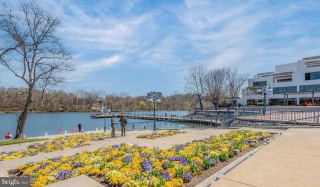 a view of a playground with basketball court
