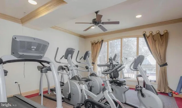 a kitchen with stainless steel appliances wooden cabinets and a sink