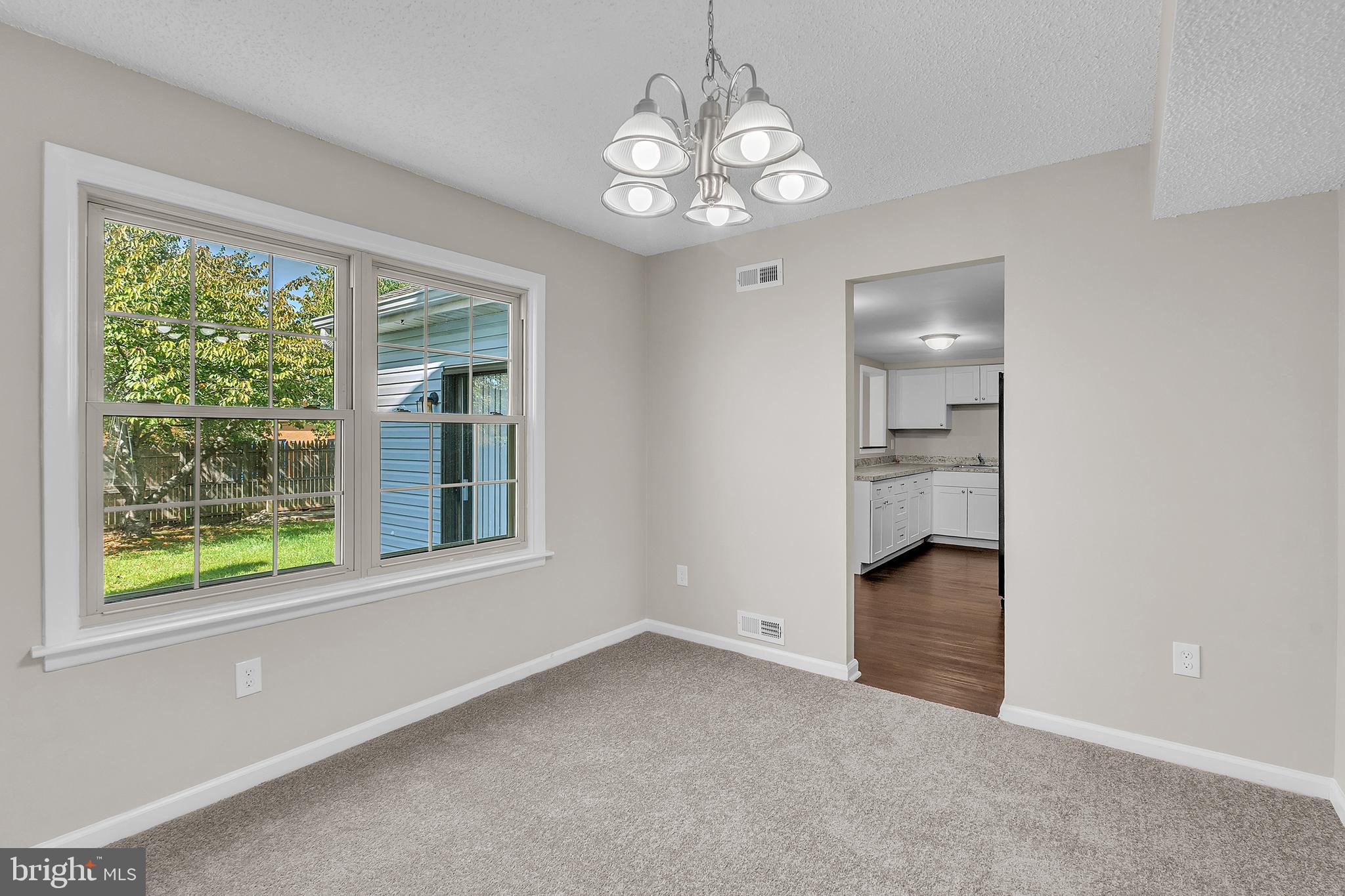 55 Hamilton Street Swedesboro, NJ 08085 - Photo 16 of 48 en empty room with windows and outdoor view
