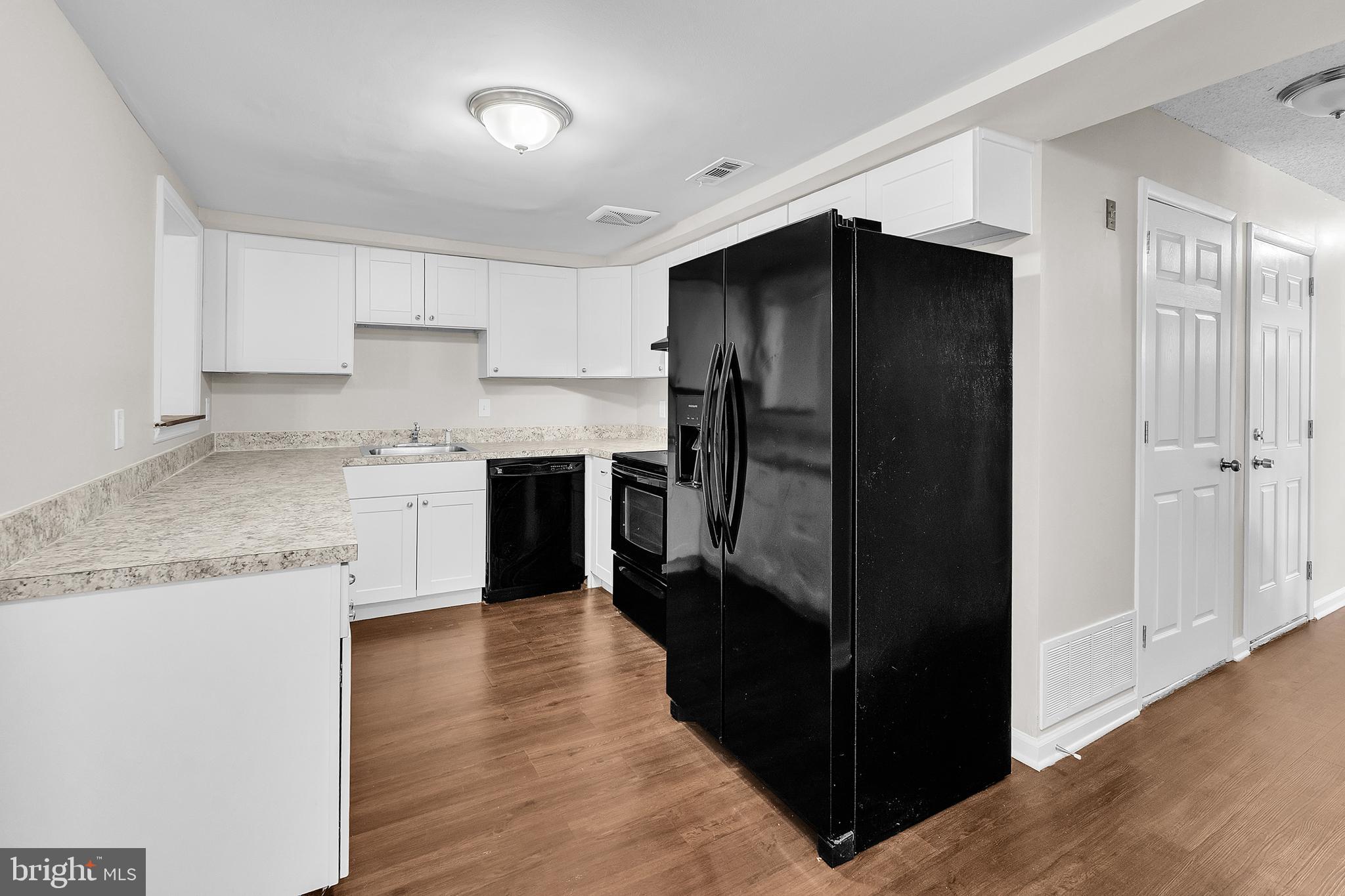 55 Hamilton Street Swedesboro, NJ 08085 - Photo 20 of 48 a kitchen with stainless steel appliances granite countertop a refrigerator and a sink