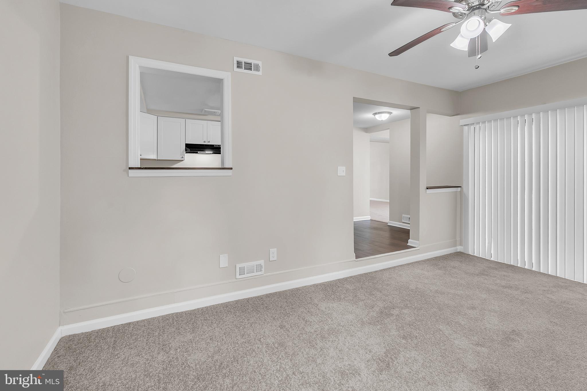 55 Hamilton Street Swedesboro, NJ 08085 - Photo 30 of 48 an empty room with chandelier fan