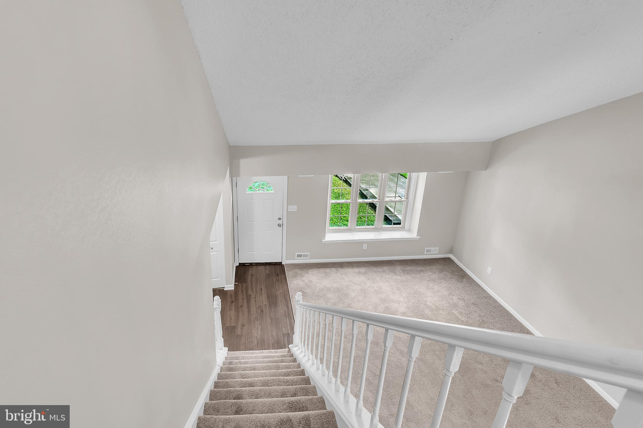 55 Hamilton Street Swedesboro, NJ 08085 - Photo 31 of 48 a view of a hallway with a window