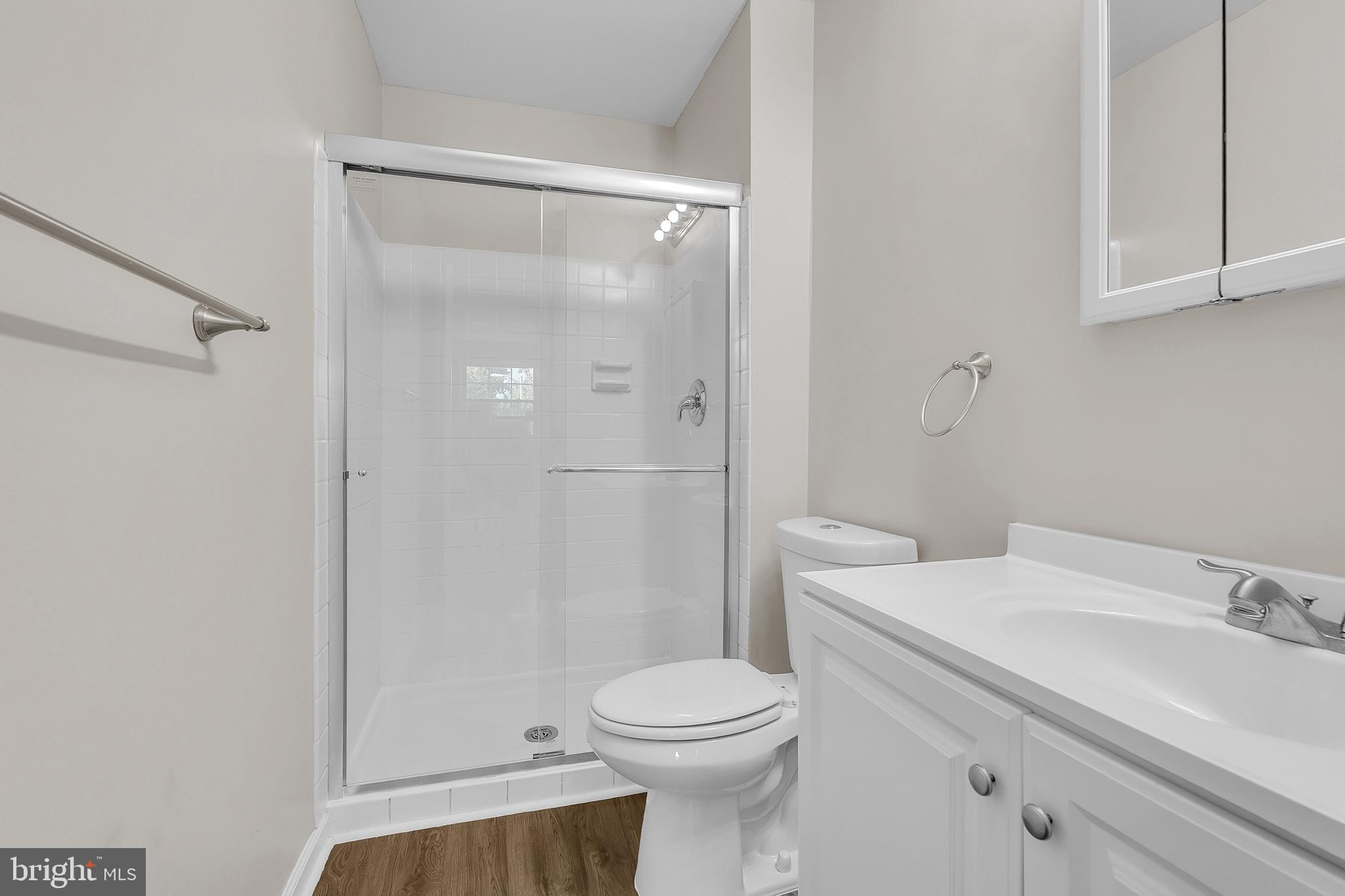 55 Hamilton Street Swedesboro, NJ 08085 - Photo 44 of 48 a bathroom with a sink a toilet and shower