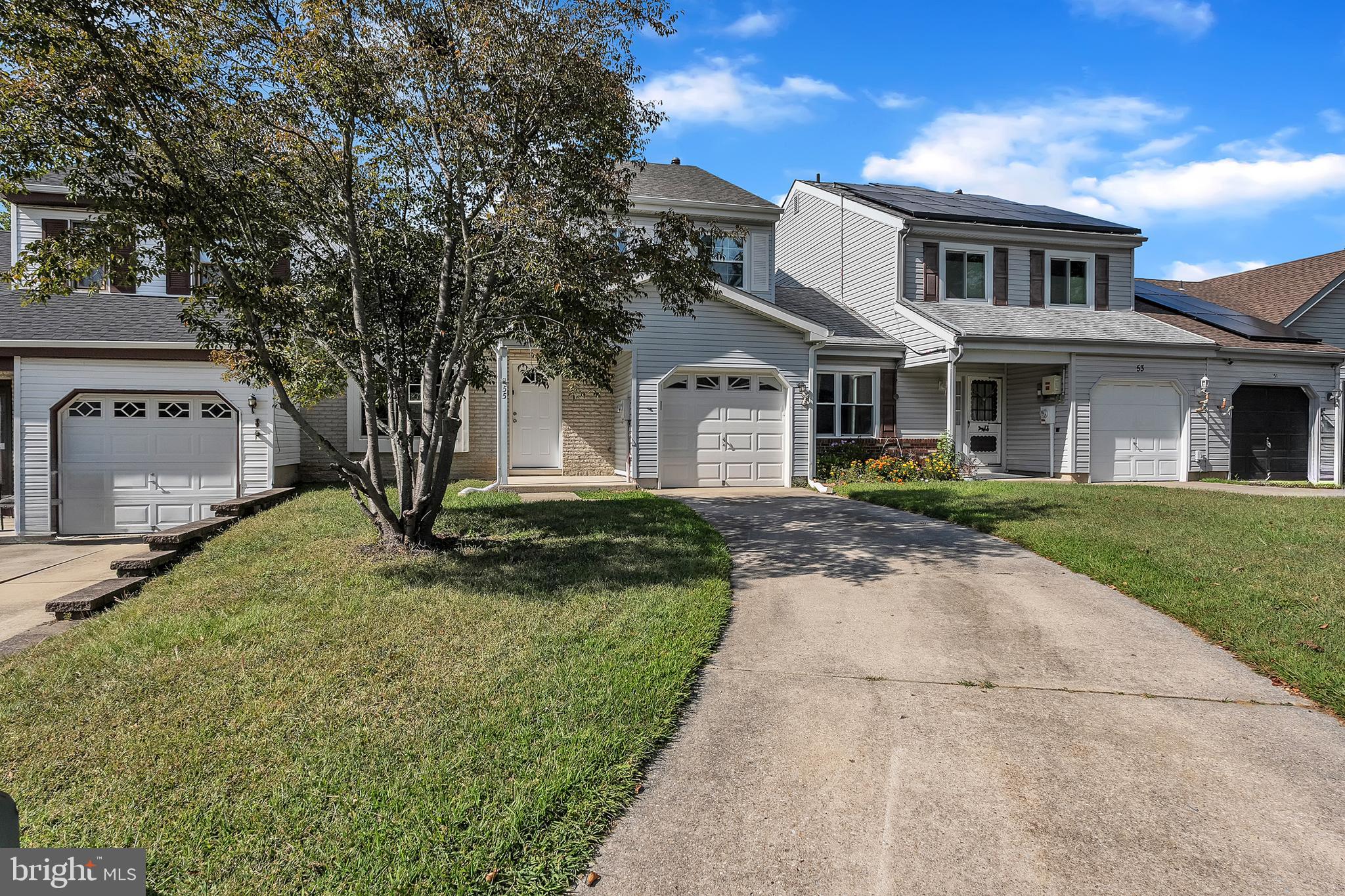 55 Hamilton Street Swedesboro, NJ 08085 - Photo 5 of 48 a front view of a house with a yard