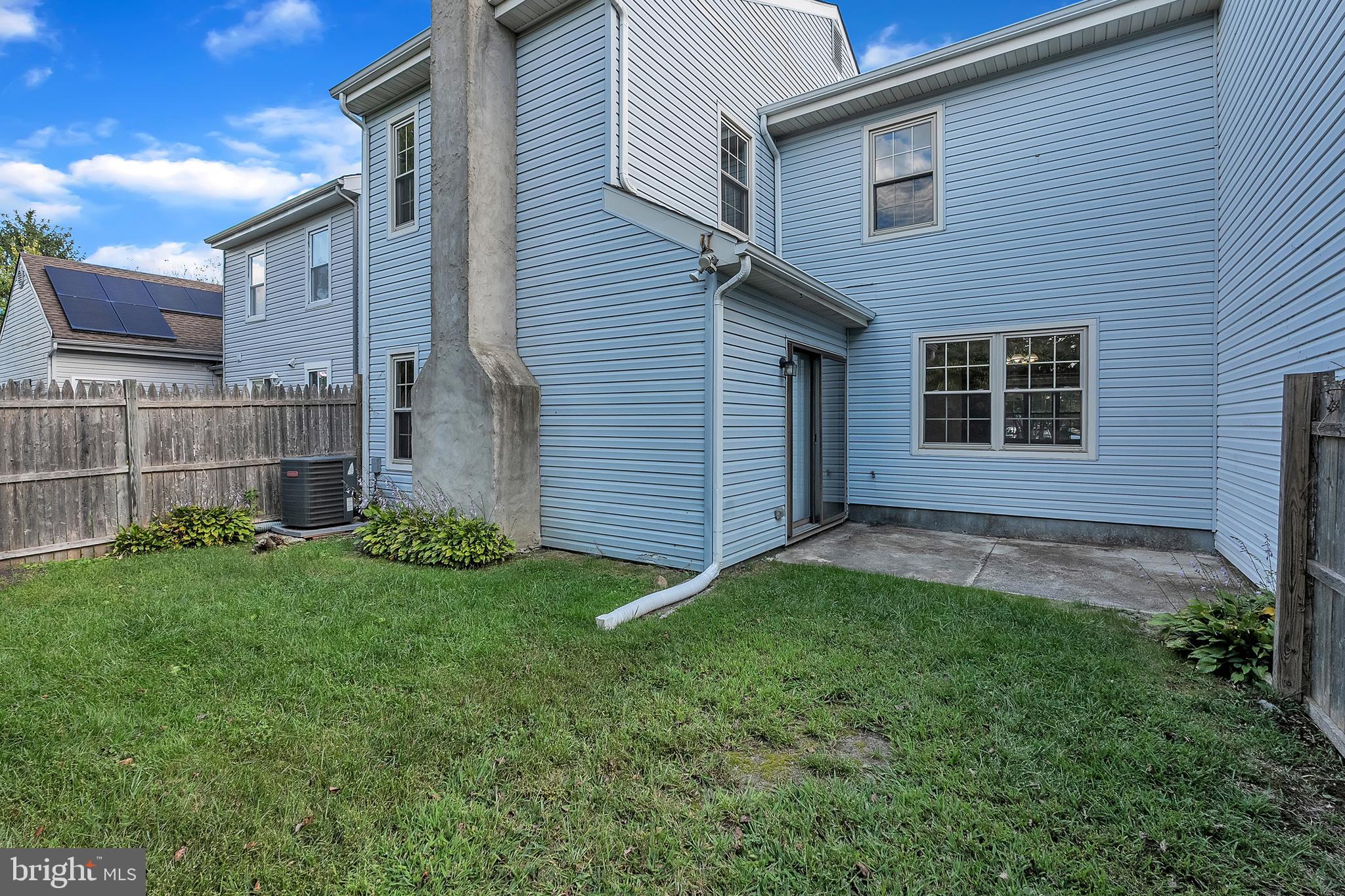55 Hamilton Street Swedesboro, NJ 08085 - Photo 10 of 48 a view of a backyard with plants and large tree