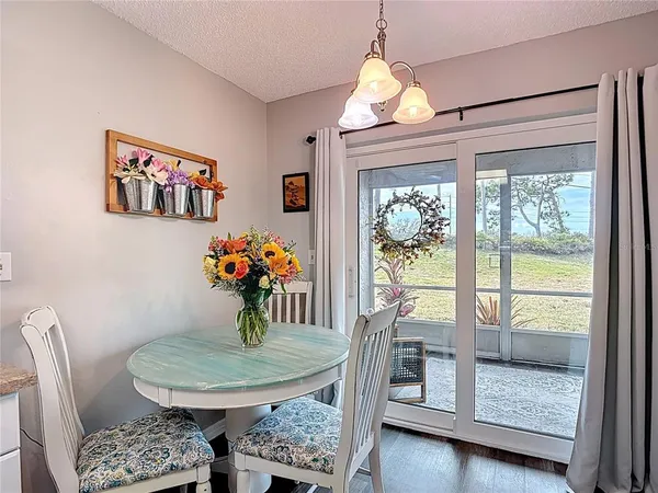 a kitchen with cabinets a sink and appliances