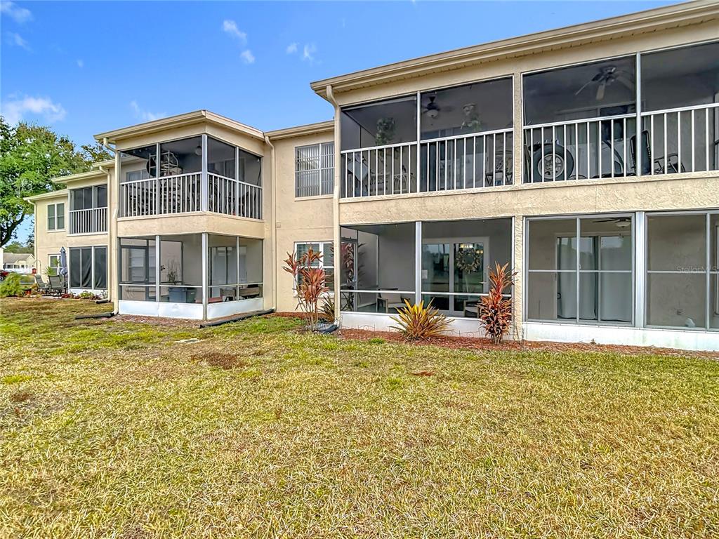 7828 Hardwick Drive, Unit 916 New Port Richey, FL 34653 - Photo 37 of 40 a large building with a large window