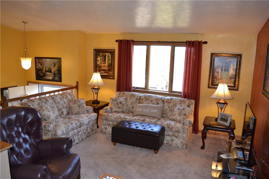 60 Windcrest Drive Cecil, PA 15321 - Photo 12 of 25 Kitchen & Dining room are open to the family room. Vaulted ceilings, and brand new carpet installed in January 2016!