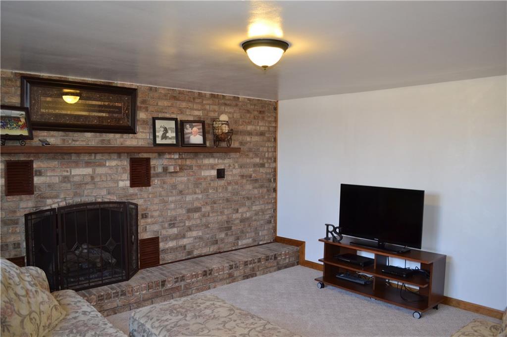 60 Windcrest Drive Cecil, PA 15321 - Photo 21 of 25 Large basement with gas fireplace! Brand new carpet installed in January 2016.