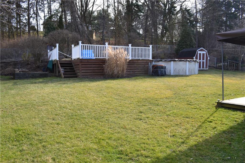 60 Windcrest Drive Cecil, PA 15321 - Photo 23 of 25 Huge Backyard! Hard to come by a yard like this. Heated Pool with large deck.