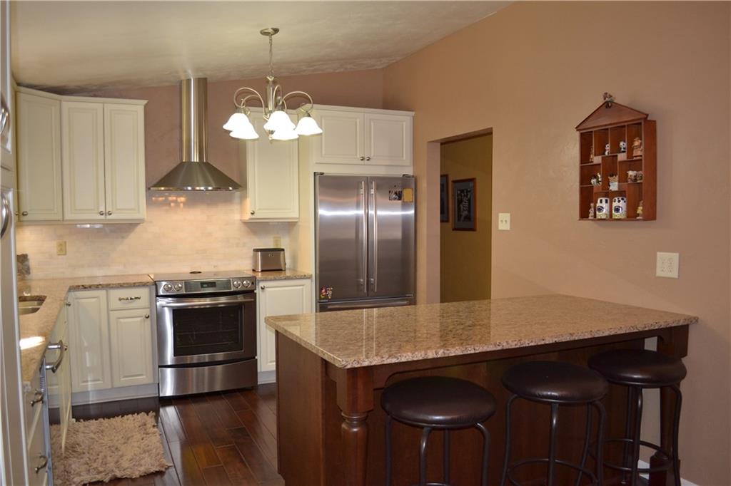 60 Windcrest Drive Cecil, PA 15321 - Photo 7 of 25 Seating for three at the large kitchen island!