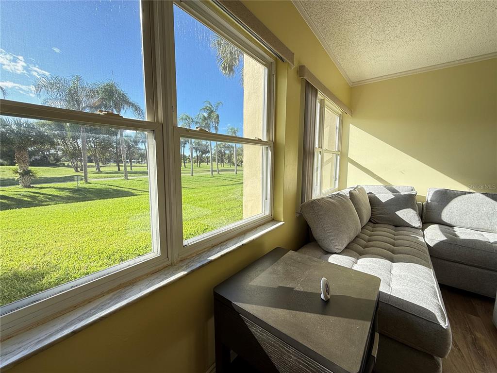 12200 Vonn Road, Unit 2105 Largo, FL 33774 - Photo 14 of 37 a living room with large window