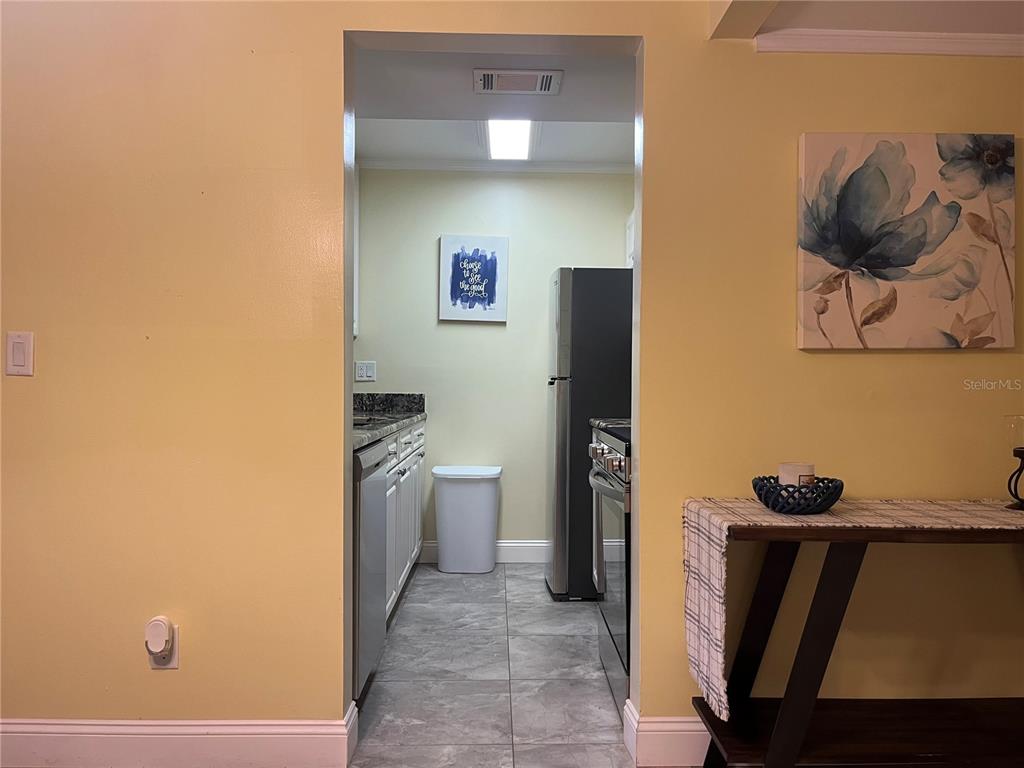 12200 Vonn Road, Unit 2105 Largo, FL 33774 - Photo 16 of 37 a bathroom with a sink and a mirror