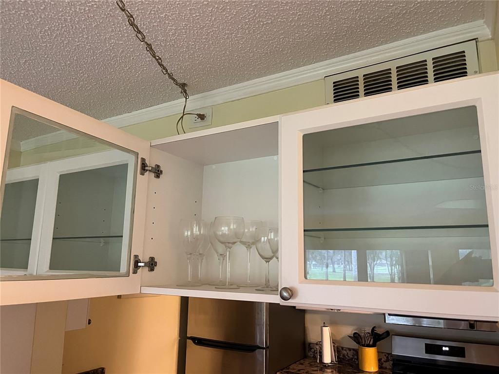 12200 Vonn Road, Unit 2105 Largo, FL 33774 - Photo 20 of 37 a living room with a window