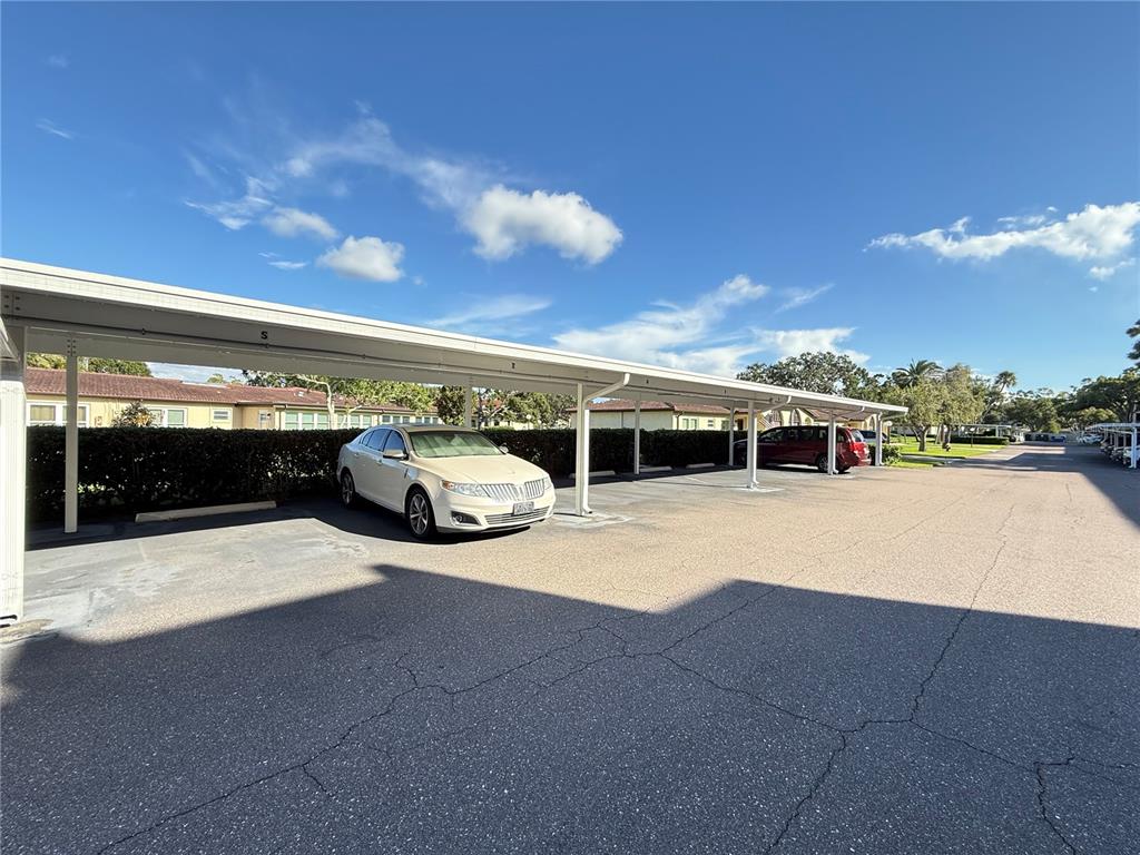 12200 Vonn Road, Unit 2105 Largo, FL 33774 - Photo 31 of 37 a view of a parking area