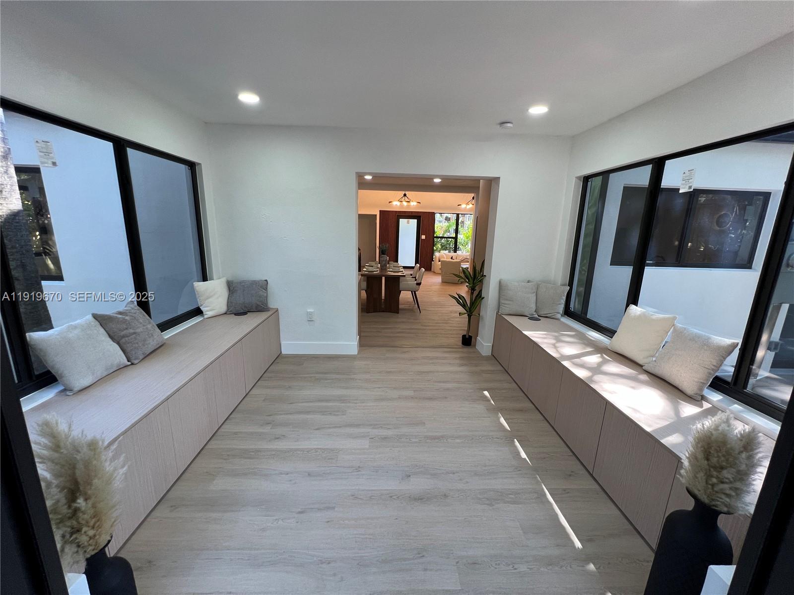 751 Northeast 80th Street Miami, FL 33138 - Photo 17 of 32 a living room with furniture and window