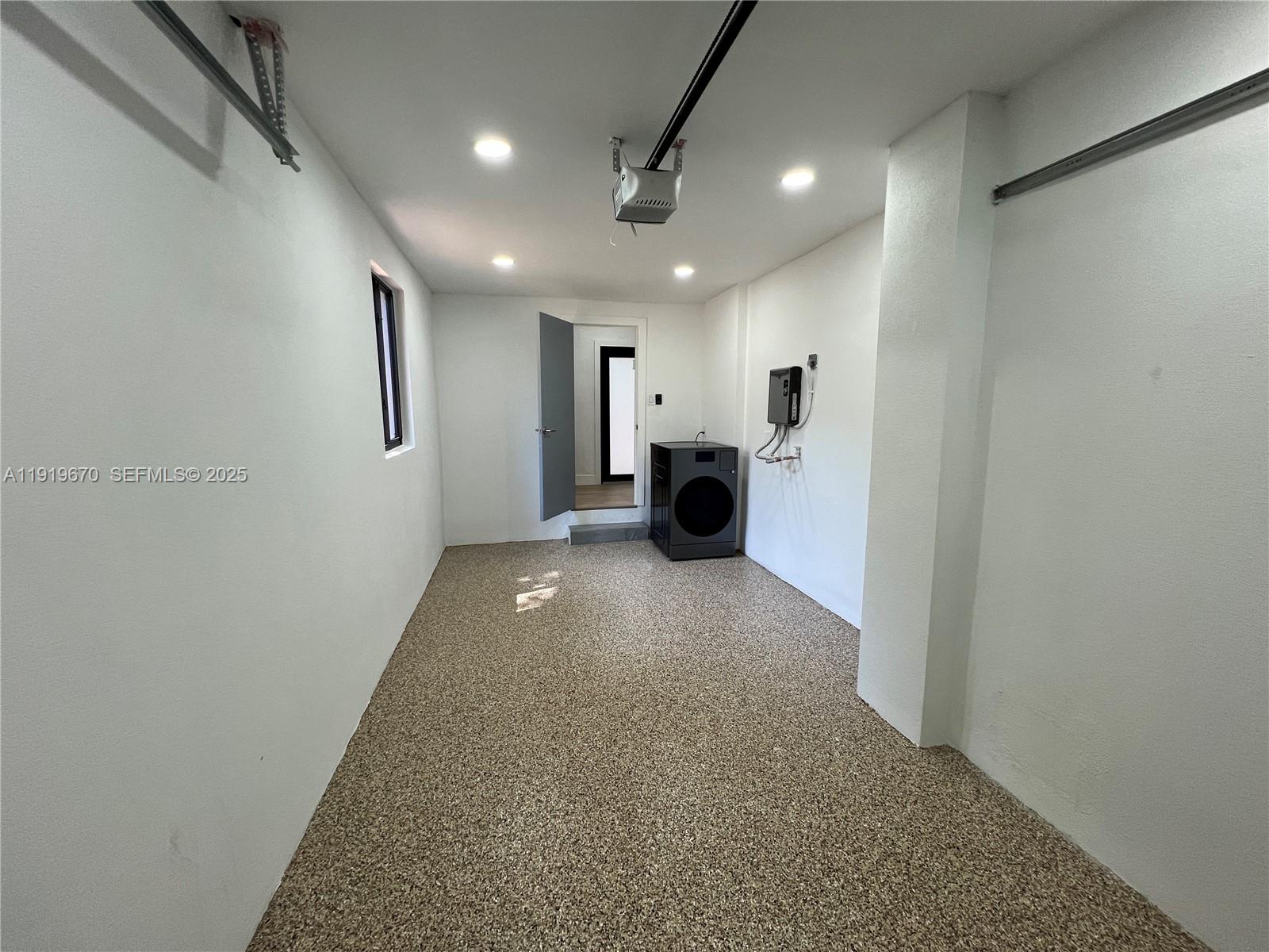 751 Northeast 80th Street Miami, FL 33138 - Photo 26 of 32 a view of empty room with a fireplace