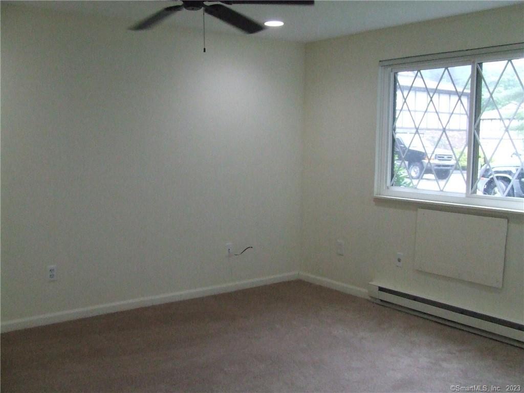 2 Branch Road, Unit 6A Thomaston, CT 06787 - Photo 11 of 19 an empty room with a window