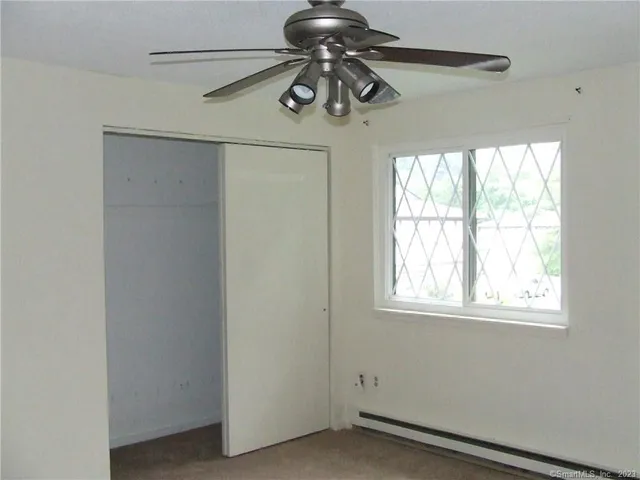 a window in an empty room