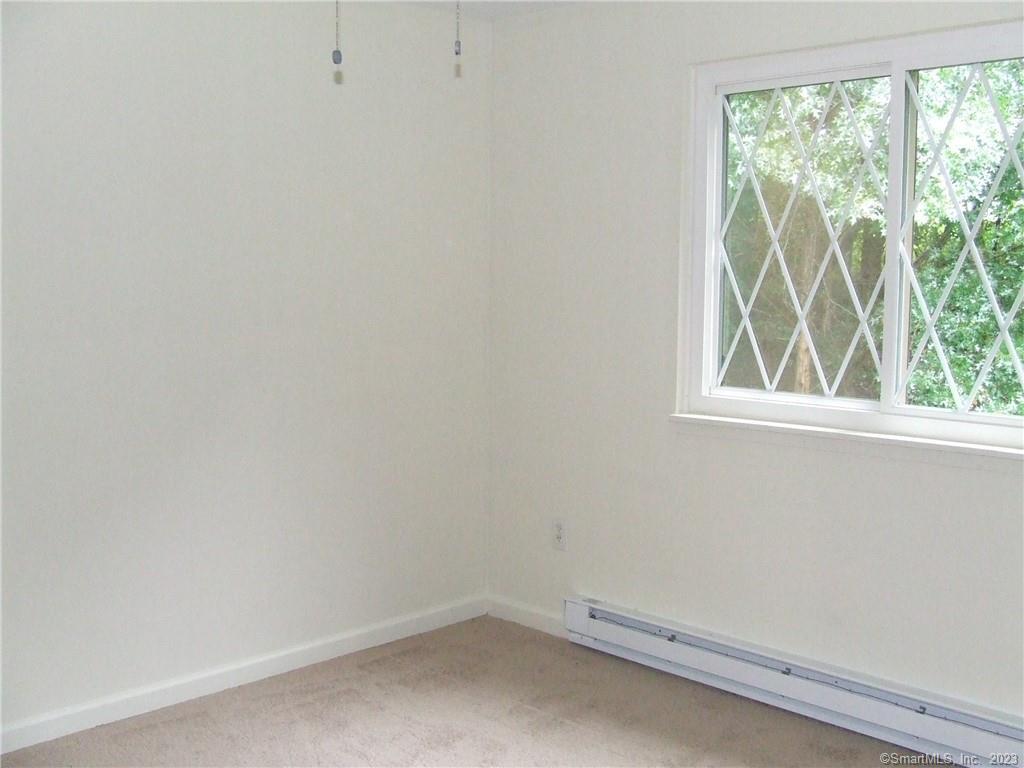 2 Branch Road, Unit 6A Thomaston, CT 06787 - Photo 16 of 19 a small space with a window