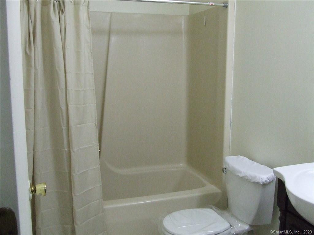 2 Branch Road, Unit 6A Thomaston, CT 06787 - Photo 18 of 19 a bathroom with a shower and a toilet