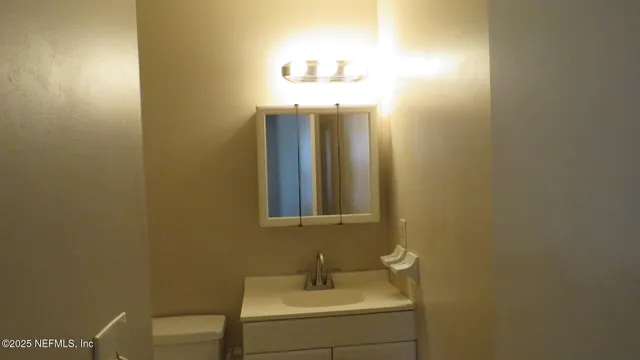 a bathroom with a shower and toilet