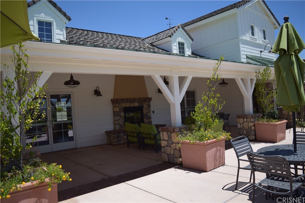 26500 Township Street Saugus, CA 91350 - Photo 17 of 20 a view of a house with potted plants