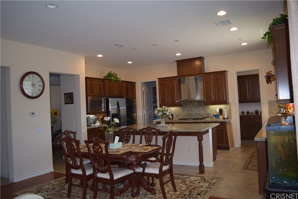 26500 Township Street Saugus, CA 91350 - Photo 6 of 20 a kitchen with a table and chairs in it
