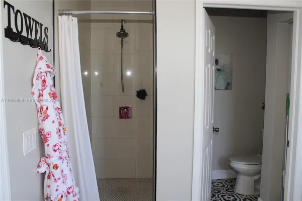a bathroom with a sink and a window