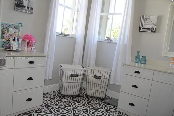 a view of livingroom with furniture and wooden floor