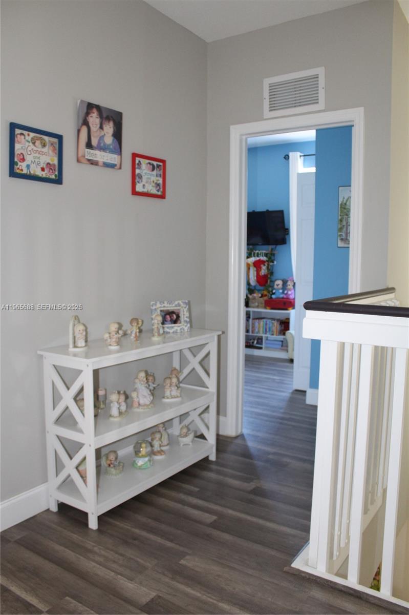 20135 Southwest 129th Avenue Miami, FL 33177 - Photo 20 of 54 a view of livingroom with furniture and wooden floor