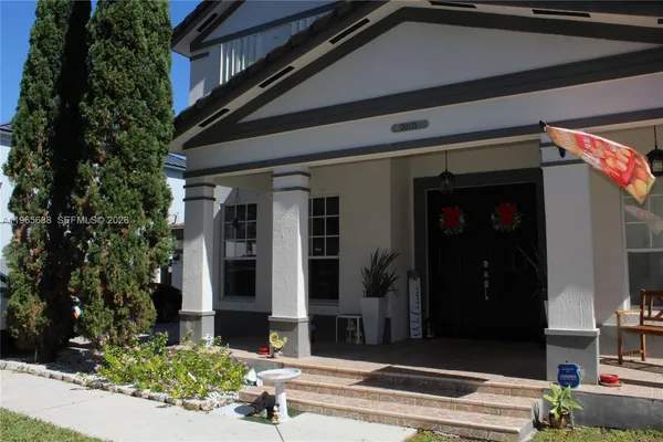 a front view of house with yard