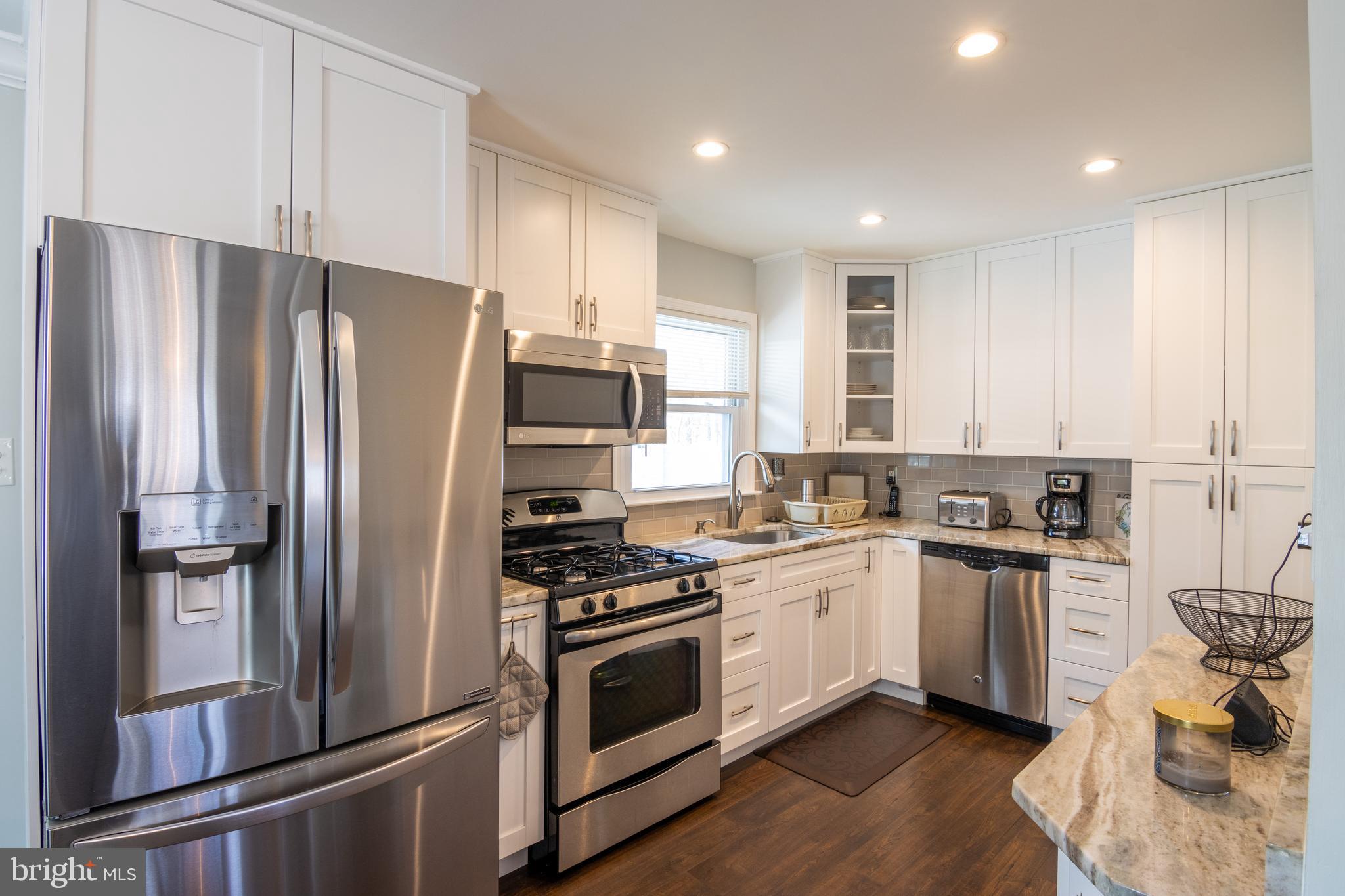 8 Holly Road Pasadena, MD 21122 - Photo 17 of 71 Newly Renovated - Bright white Kitchen
