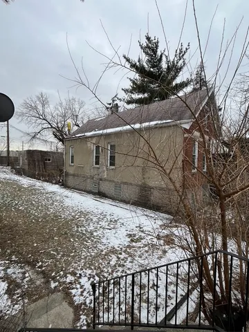 a view of a house with a snow